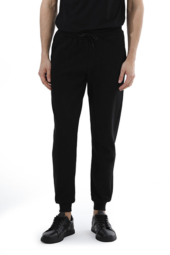Crew Up Regular Fit İpli Ottoman Kumaş Ribana Paça Erkek Eşofman 2617207010 Siyah Crew Up Regular Fit İpli Ottoman Kumaş Ribana Paça Erkek Eşofman 2617207010 Siyah