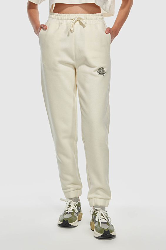 New Balance Kadın Eşofman Altı WNP3404 SST Kırık beyaz New Balance Kadın Eşofman Altı WNP3404 SST Kırık beyaz